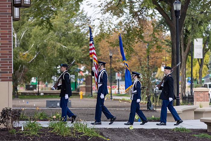 colorguard walking with flags