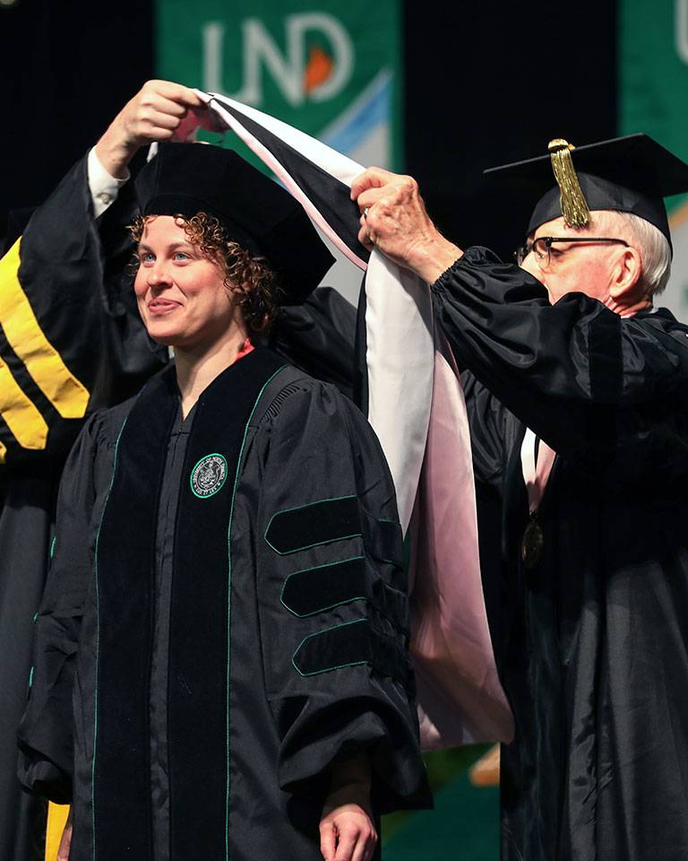 hooding a recent graduate