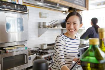 Female smiling in the kitchen