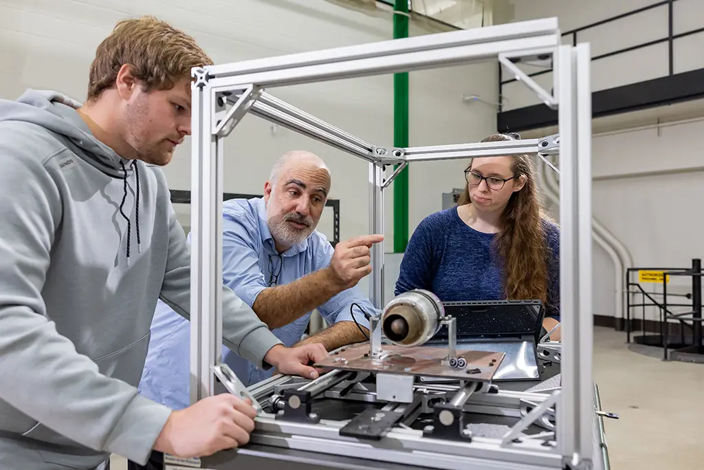 engineering students collaborating on project
