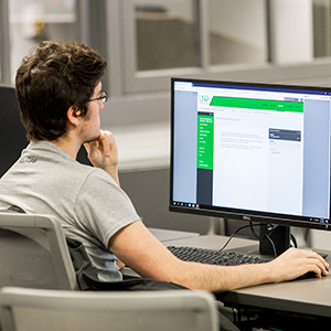 und student taking exam online