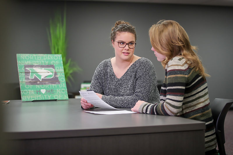 Two Staff Working Together