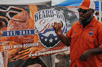 Felix Irving showing his Beard BQ Sauce in Rapid City, SD