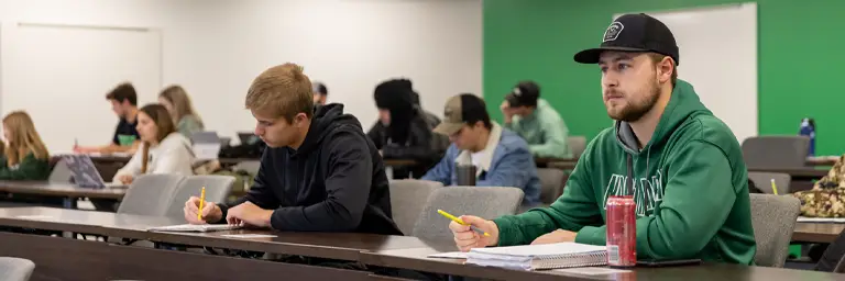 UND Economics Student in Class