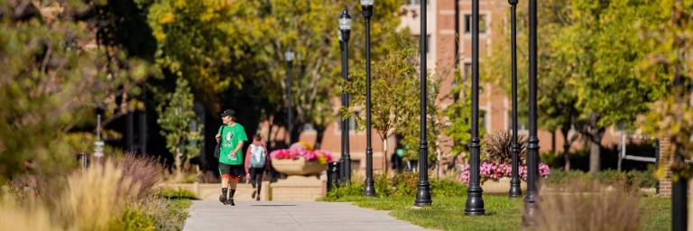 students walking on UND campus